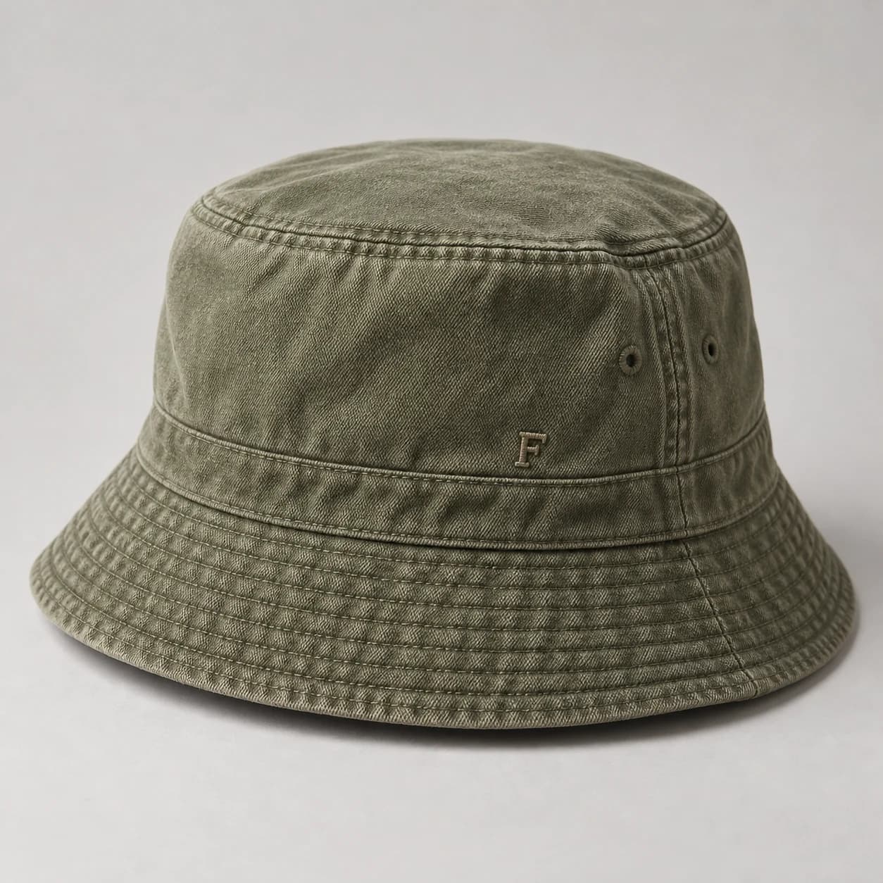 AI-generated washed bucket hat design reference illustrating soft crown / sloping brim